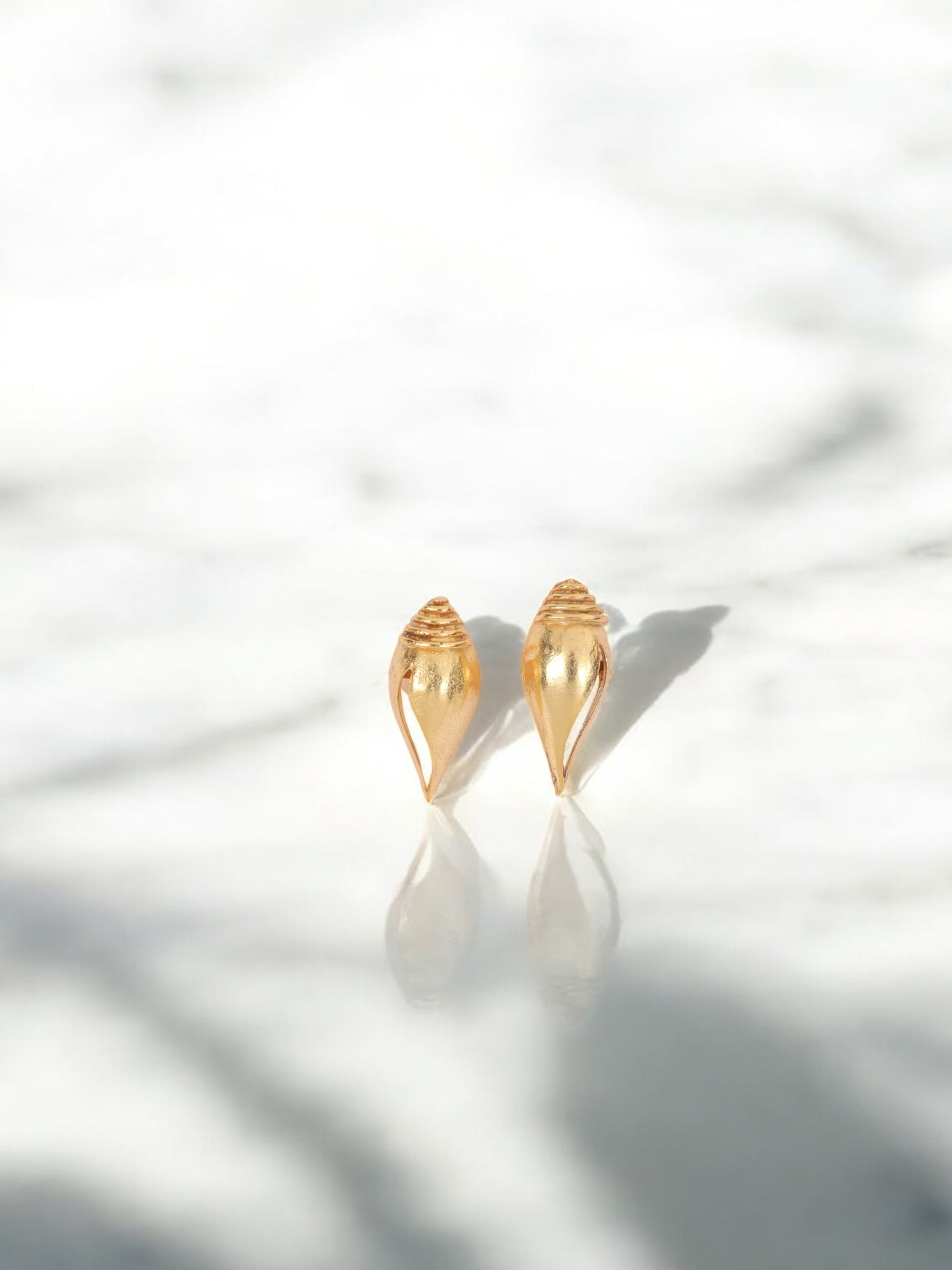 Twist of Gold Studs jewellery in 24K gold plating | XAGO Luxe