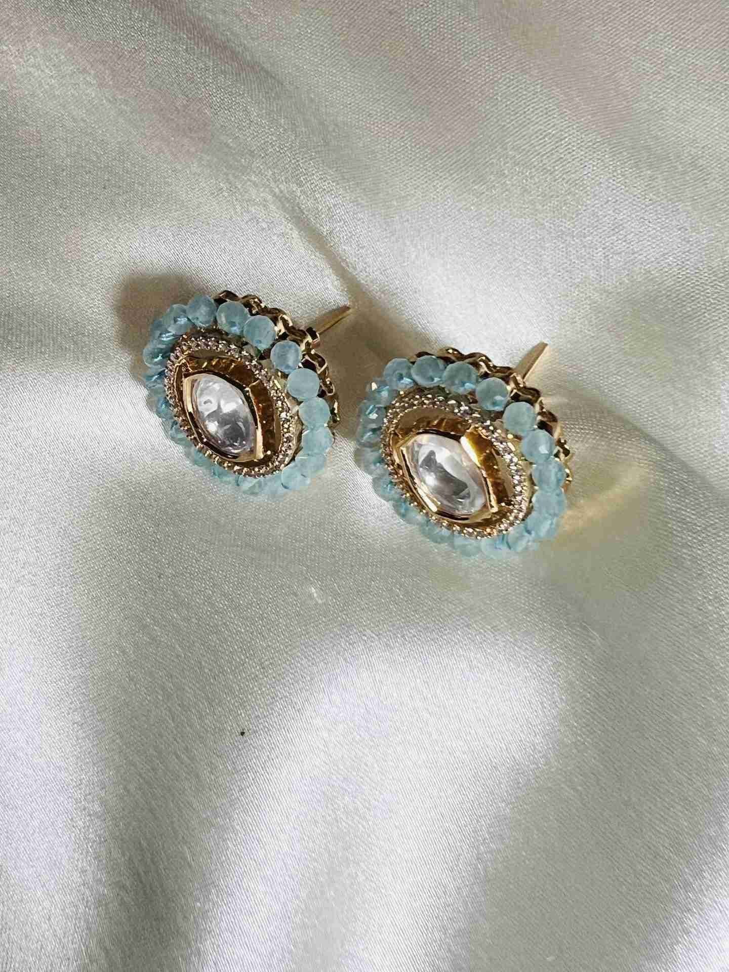 AGAPI KUNDAN STUD EARRINGS WITH BLUE BEADS jewellery in 24K gold plating | XAGO Luxe