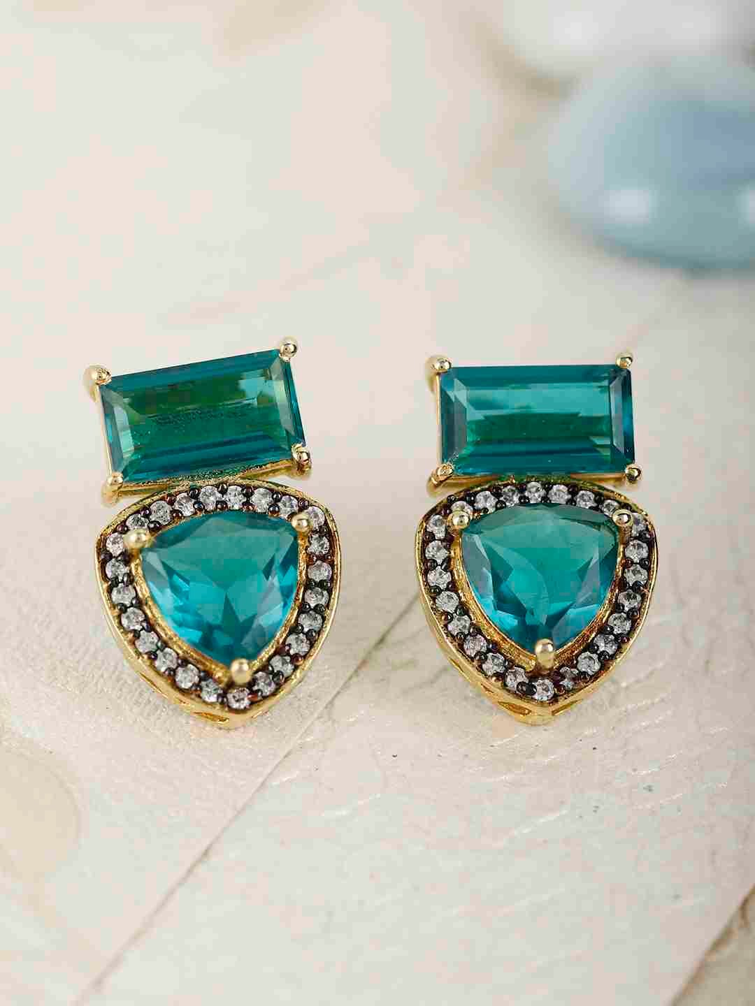 SHYLA BLUE STONE AND AD STUDDED STUDS jewellery in 24K gold plating | XAGO Luxe