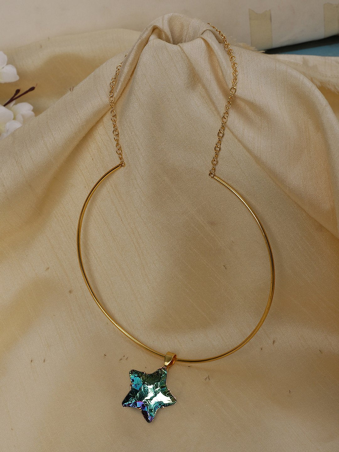 LE DEFNE GOLD PLEATED STAR SHAPE PENDANT AND CHAIN jewellery in 24K gold plating | XAGO Luxe