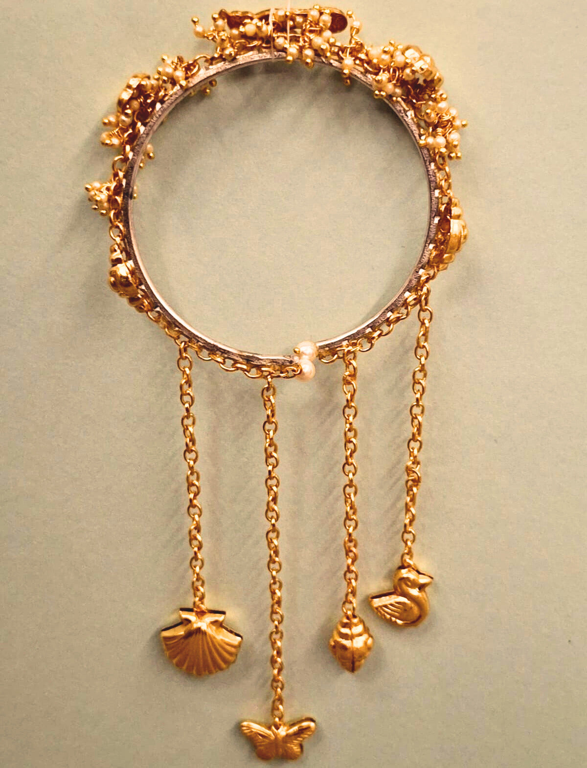 Mayura Lumba with Peacock Motif & Pearls | Rakhi for Bhabhi by XAGO designer jewellery in 24K gold plating | XAGO Luxe