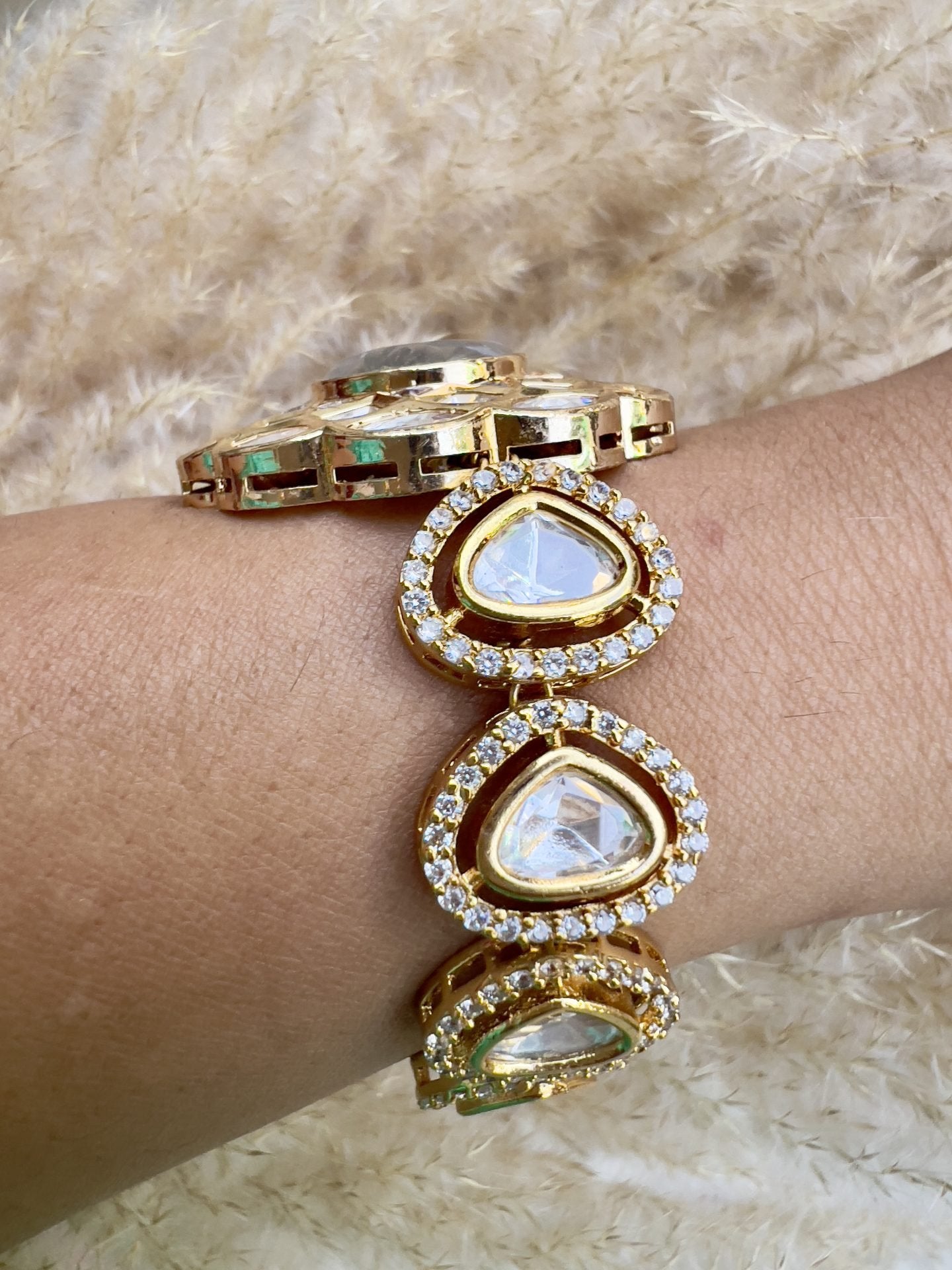 LE REINA GOLD PLATED AND WHITE KUNDAN BRACELET jewellery in 24K gold plating | XAGO Luxe