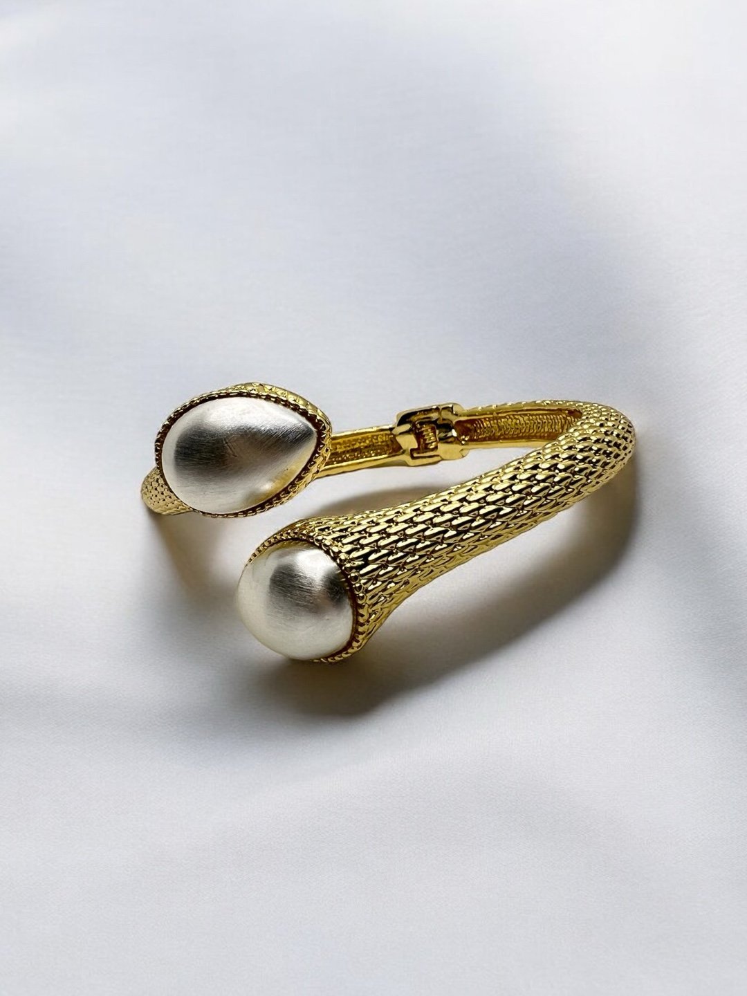 LE DAYANARA  GOLD PLATED AND WHITE STONE CUFF BRACELET jewellery in 24K gold plating | XAGO Luxe