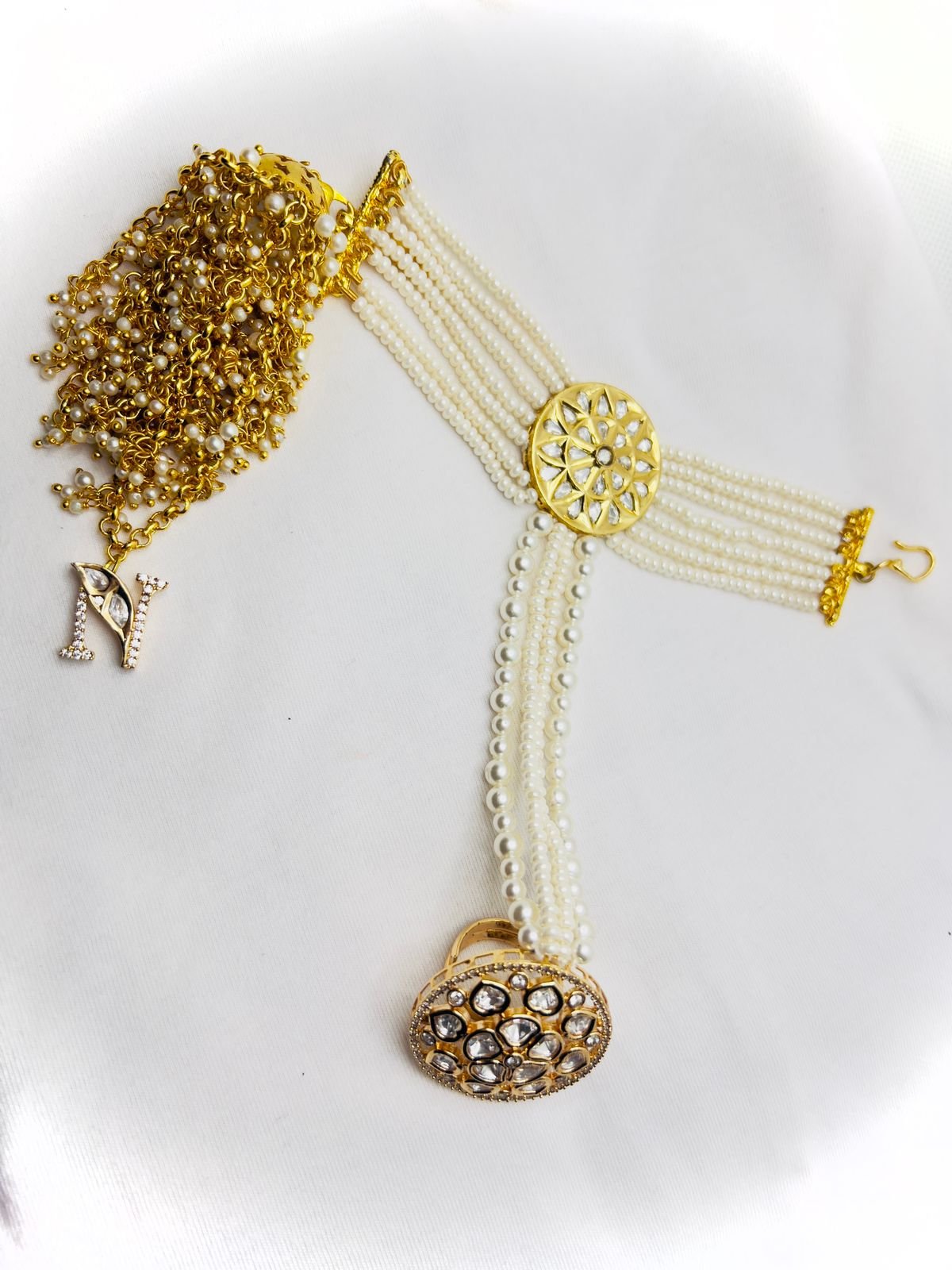 LE IRIKA WHITE PEARL & KUNDAN BRACELET jewellery in 24K gold plating | XAGO Luxe