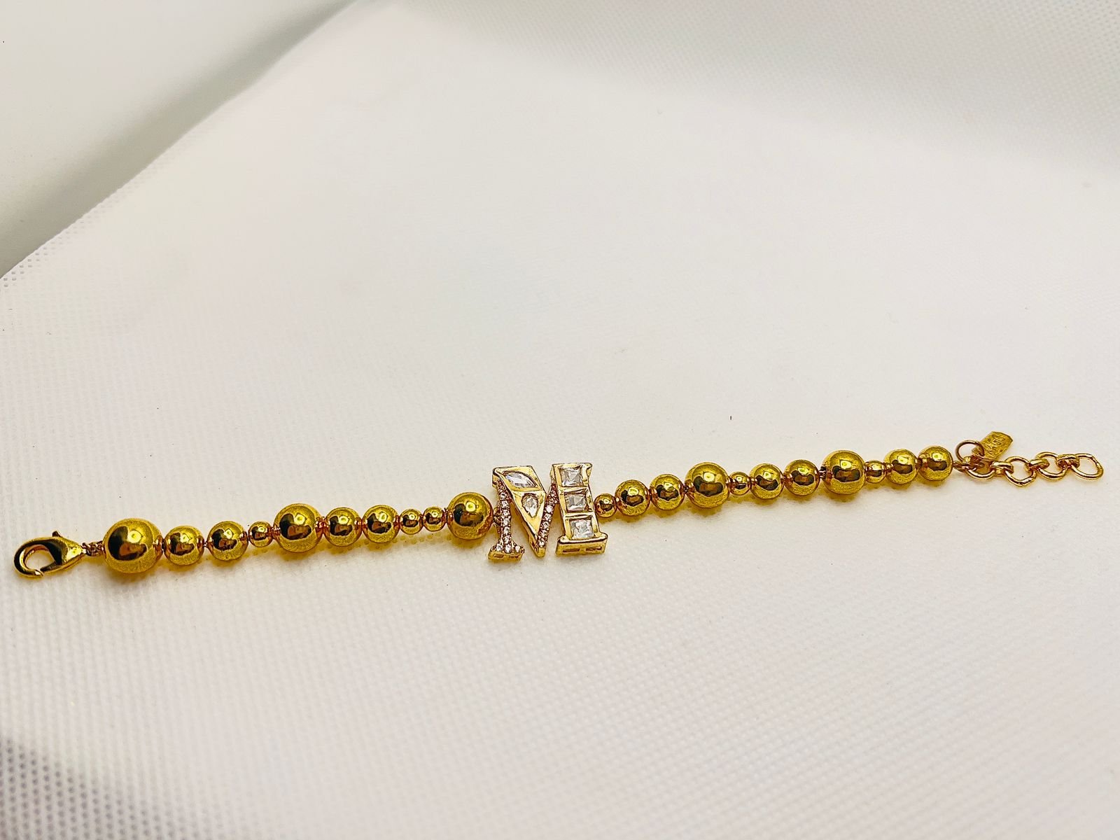 LE IJYA WHITE PEARL & KUNDAN BRACELET jewellery in 24K gold plating | XAGO Luxe