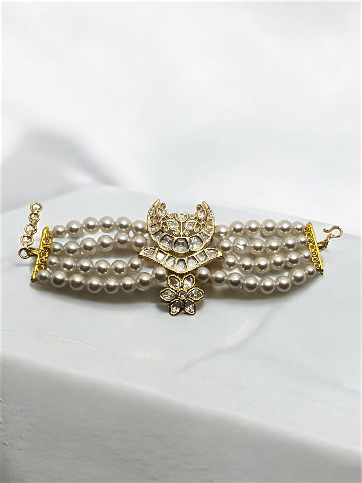 LE ABHERI WHITE PEARL & KUNDAN BRACELET jewellery in 24K gold plating | XAGO Luxe