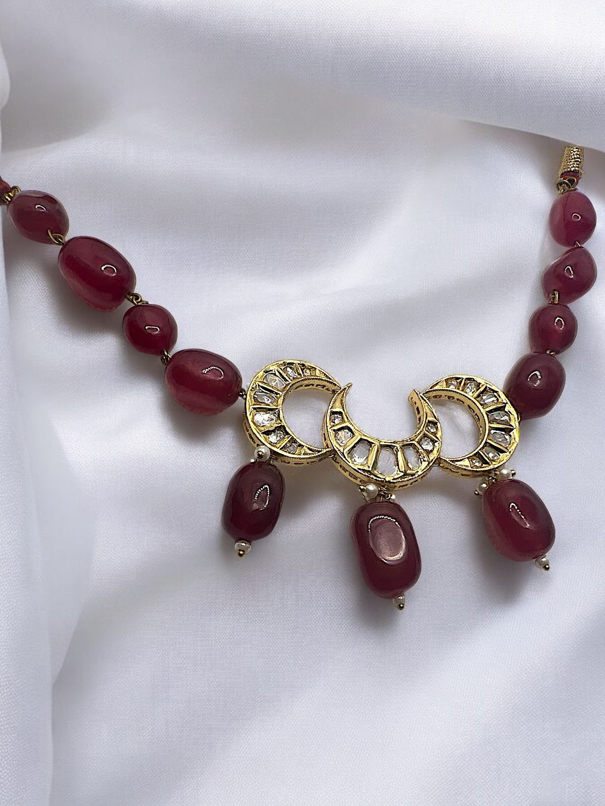 LE CADIRA MAROON BEADS & WHITE KHUNDAN NECKLACE jewellery in 24K gold plating | XAGO Luxe