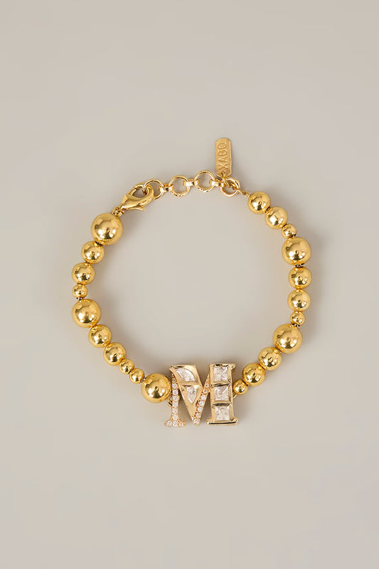 Veer Rakhi – Monogram Rakhi with Gold Beads | XAGO Rakshabandhan Edit designer jewellery in 24K gold plating | XAGO Luxe