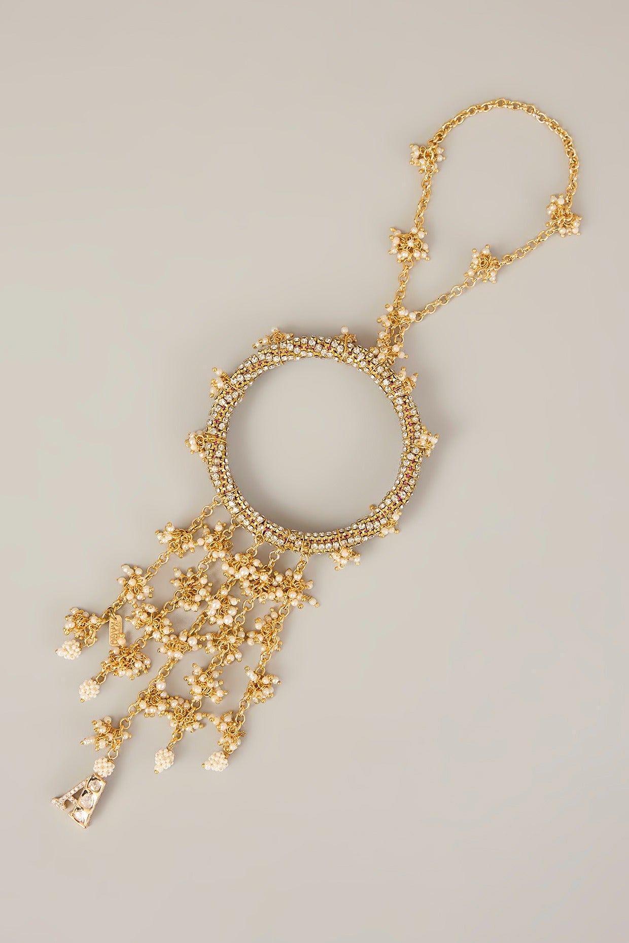 Saanvika Lumba – Polki Monogram Lumba with Pearl Motifs | Rakhi for Bhabhi by XAGO