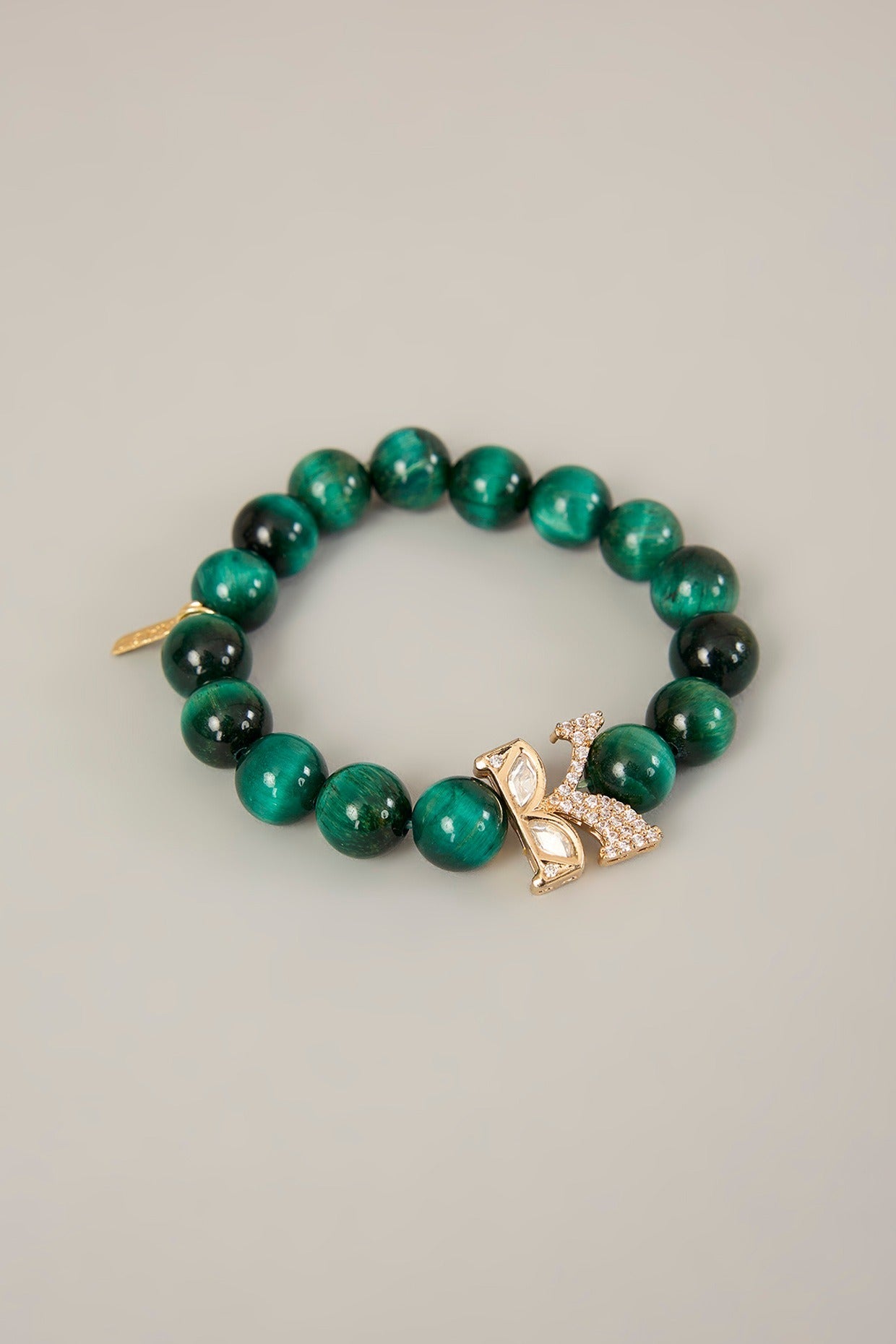 Vivaan & Sharvani Rakhi & Lumba – Polki Motif Rakhi & Lumba with Green Beads | Rakshabandhan by XAGO