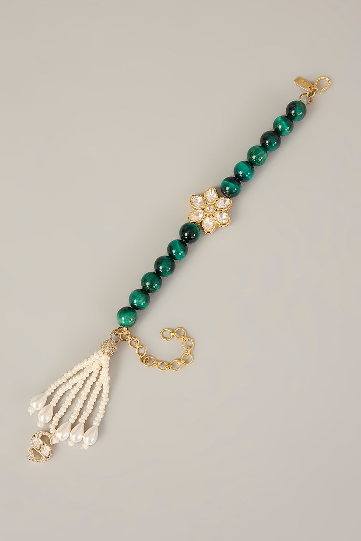 Sharvani Lumba – Handcrafted Polki Motif Lumba with Green Beads & Pearl Hangings | Rakhi for Bhabhi by XAGO designer jewellery in 24K gold plating | XAGO Luxe