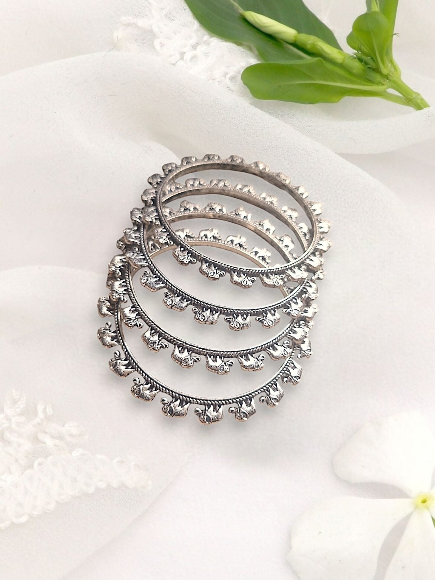 LE ANILA SET OF 4 SILVER PLATED OXIDIZED BANGLES jewellery in 24K gold plating | XAGO Luxe