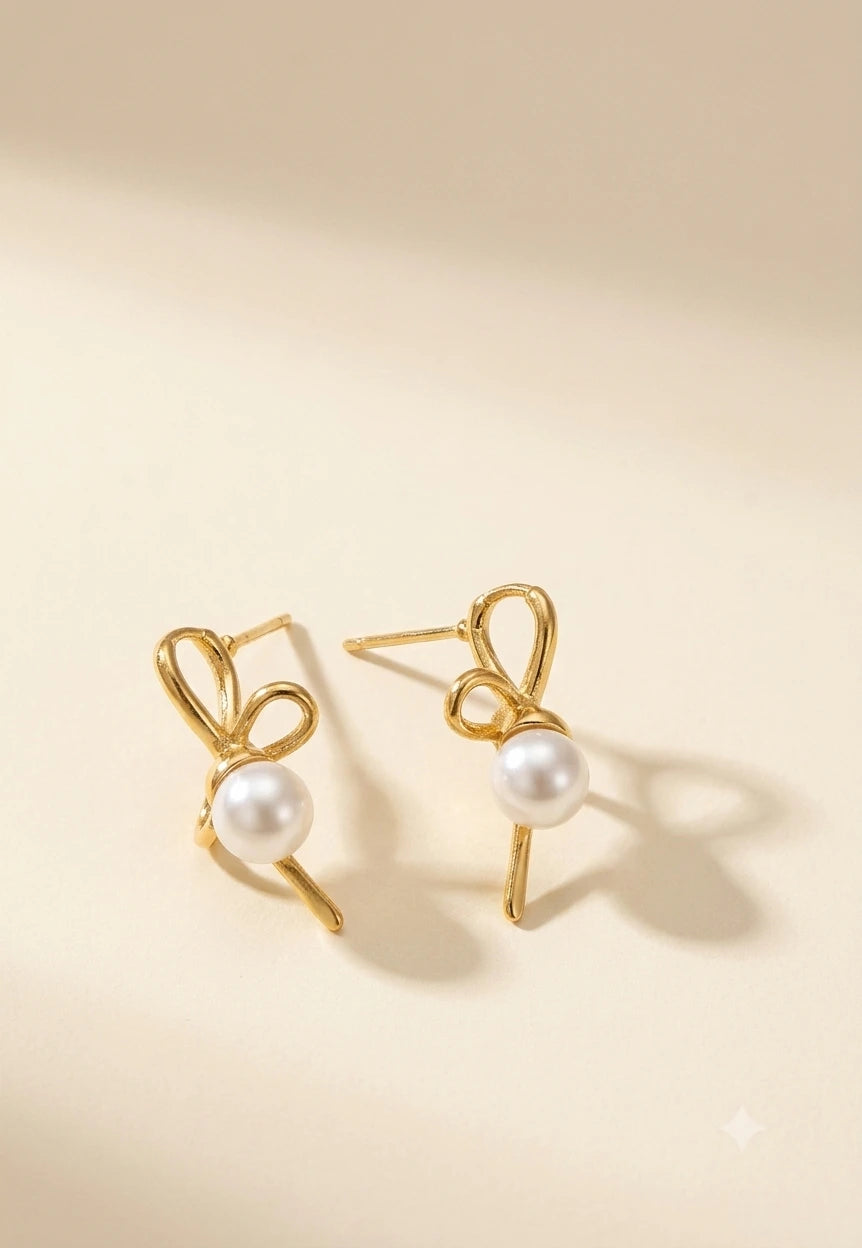 Contemporary Gold Plated Wire Bow Stud Earrings Pearl XAGO Luxe