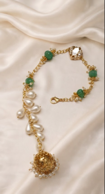 Contemporary Pearl and Green Beaded Lumba Rakhi with Jhumka