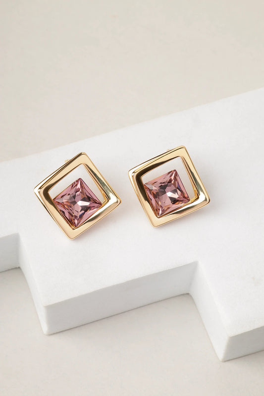 Amethyst Prism stud earrings displayed on white surface