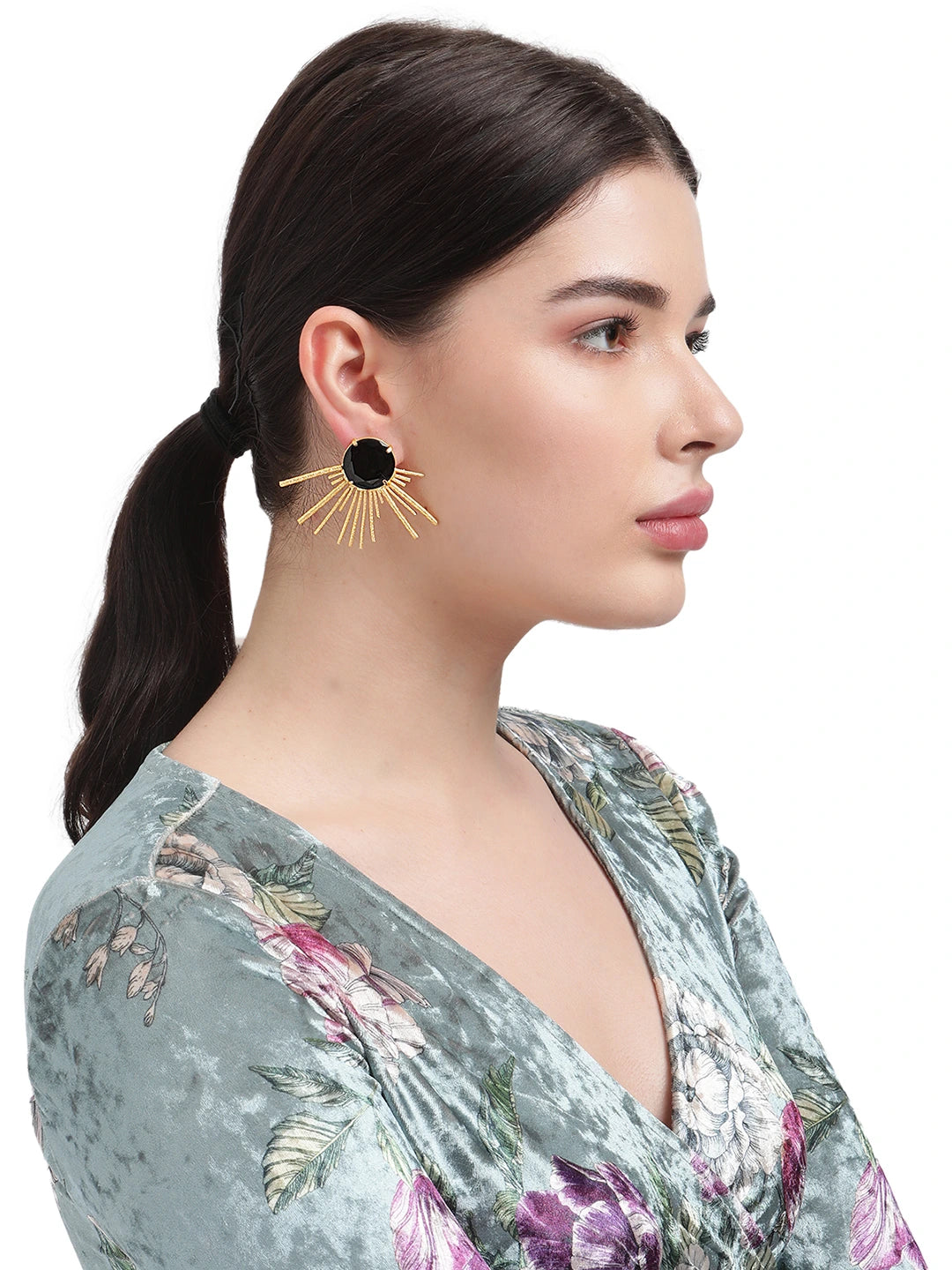 Close up of model wearing black onyx statement stud earrings