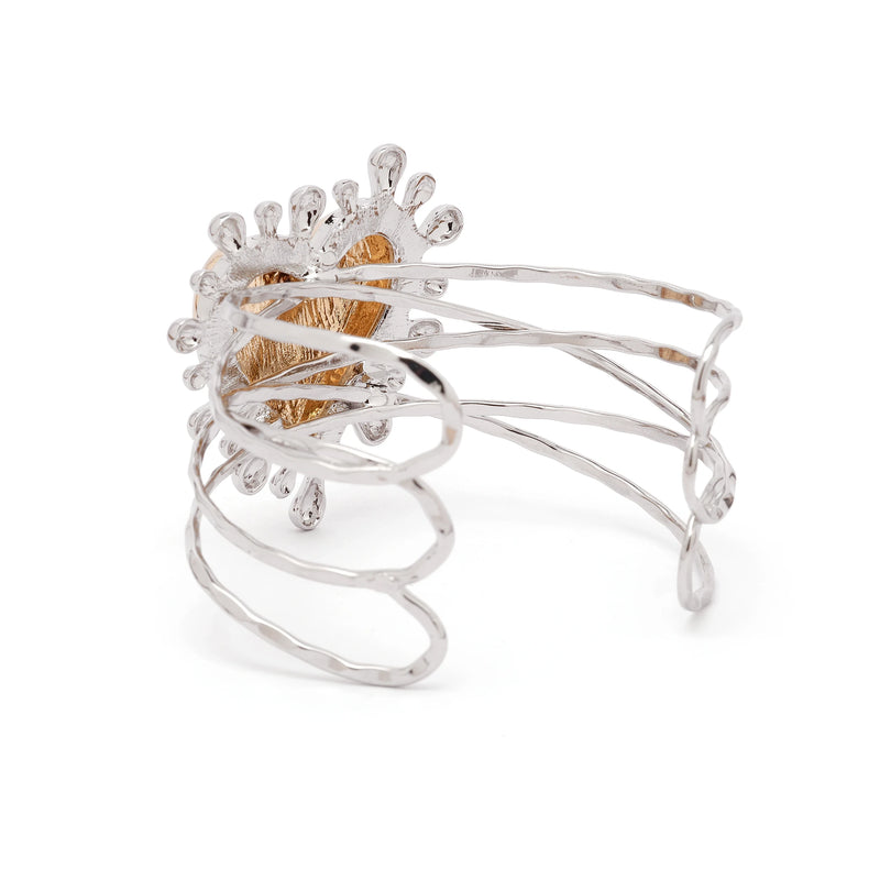 Back and side view of Sacred Heart cuff showing open adjustable design