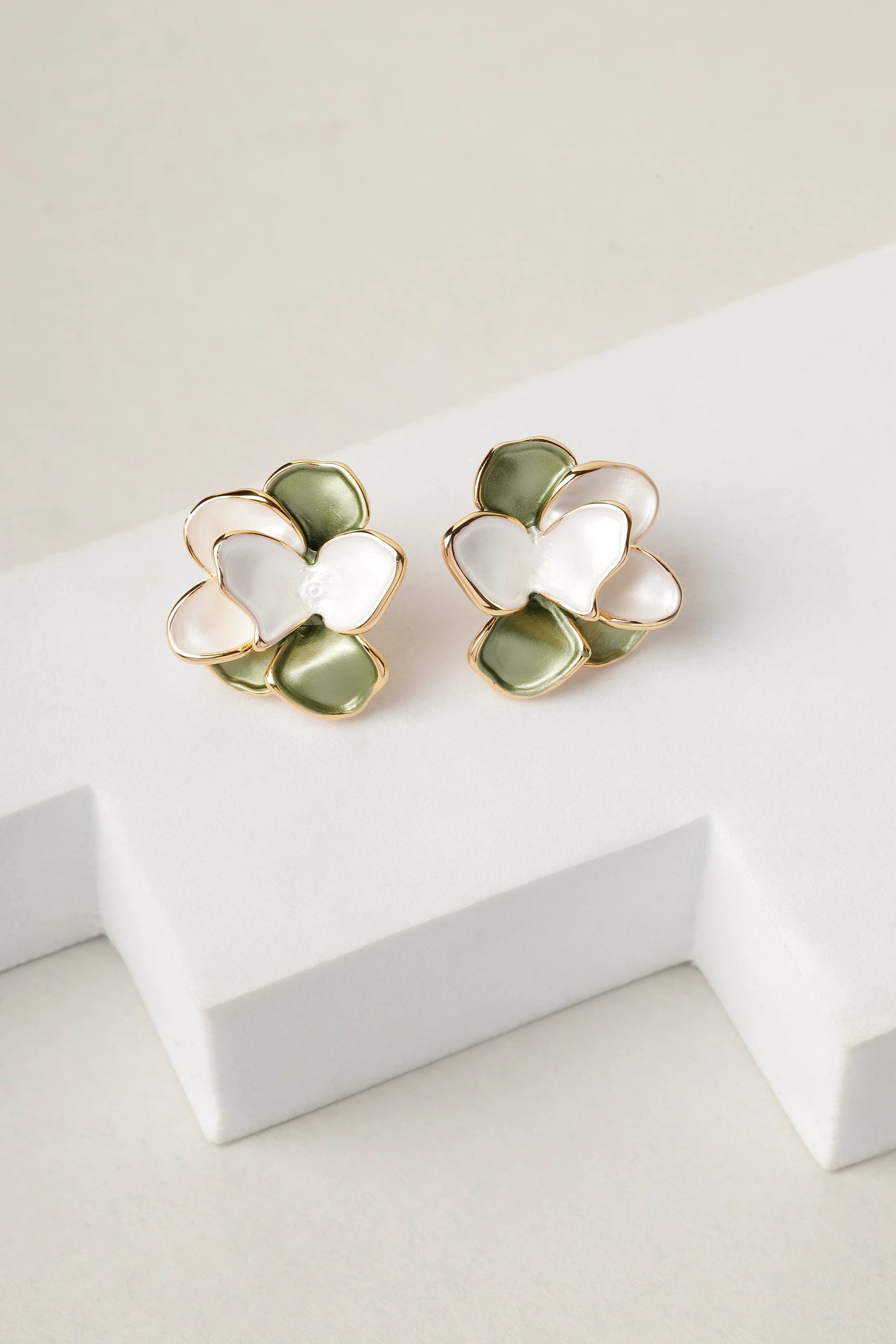 Pair of verdant bloom green and white enamel floral stud earrings