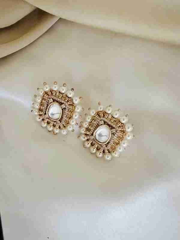 "Polki Earrings with American Diamonds and Pearls, a perfect blend of elegance and radiance."