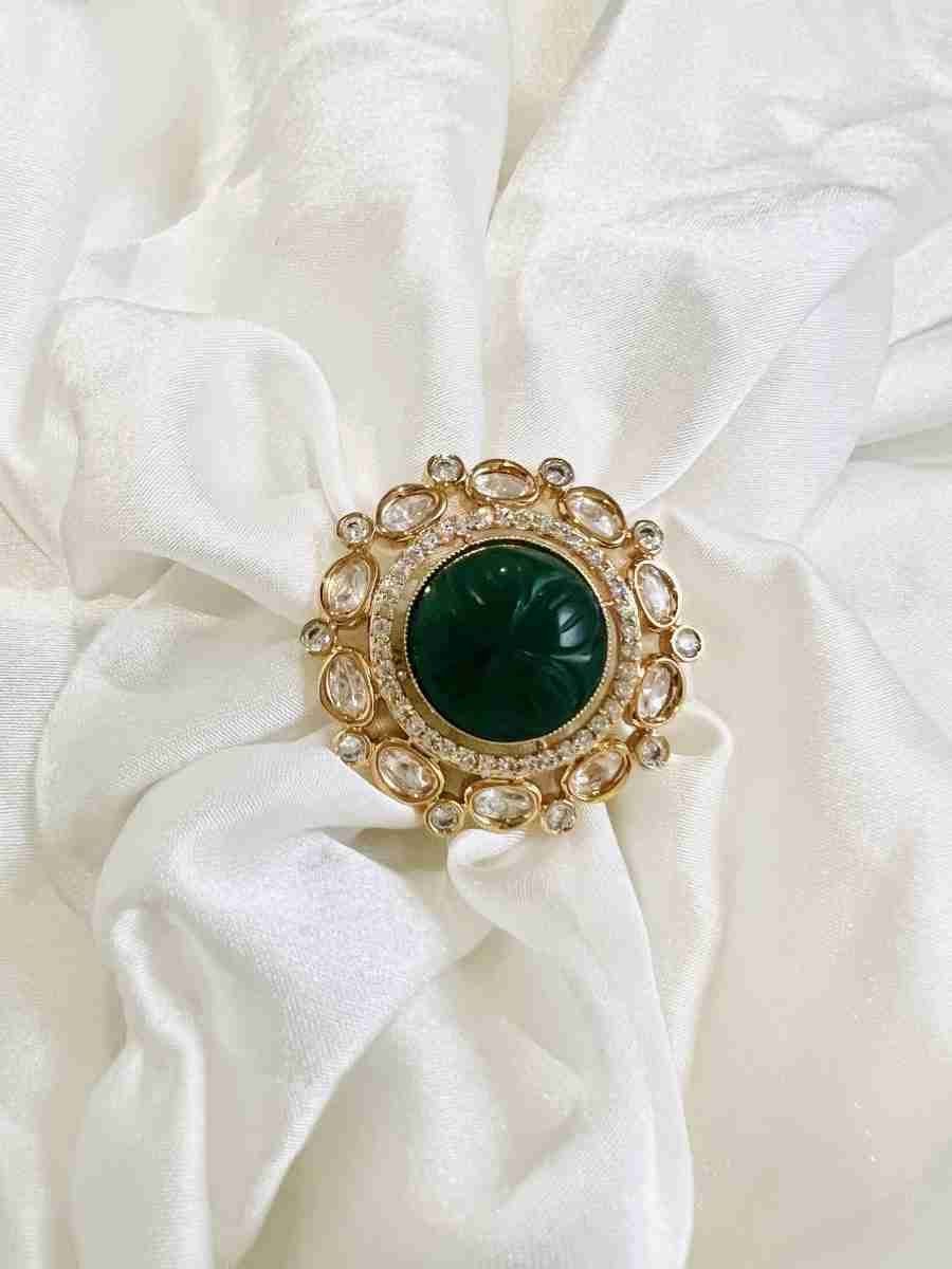 "Polki Ring with American Diamond and Carved Emerald Green Stone - Exquisite Elegance."