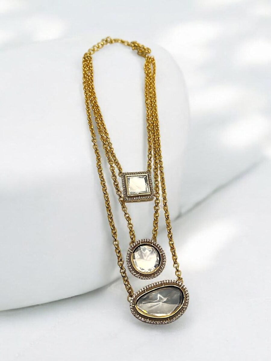 LE CAITRI GOLD AND WHITE KUNDAN NECKLACE