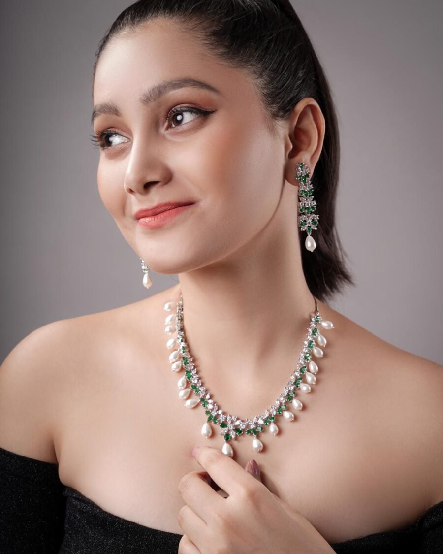 LE ELIO GREEN STONE STUDDED RHODIUM PLATED  AMERICAN DIAMOND STUDDED HANDCRAFTED JEWELLERY SET